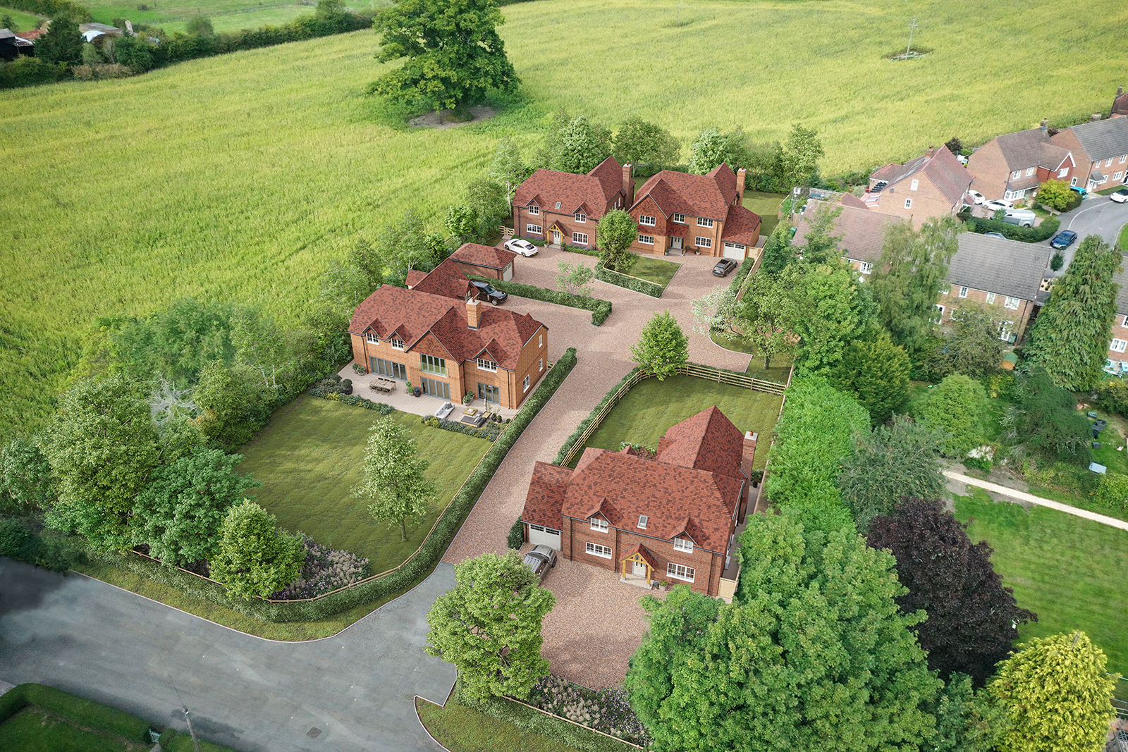 Aerial view of four country houses within the plot